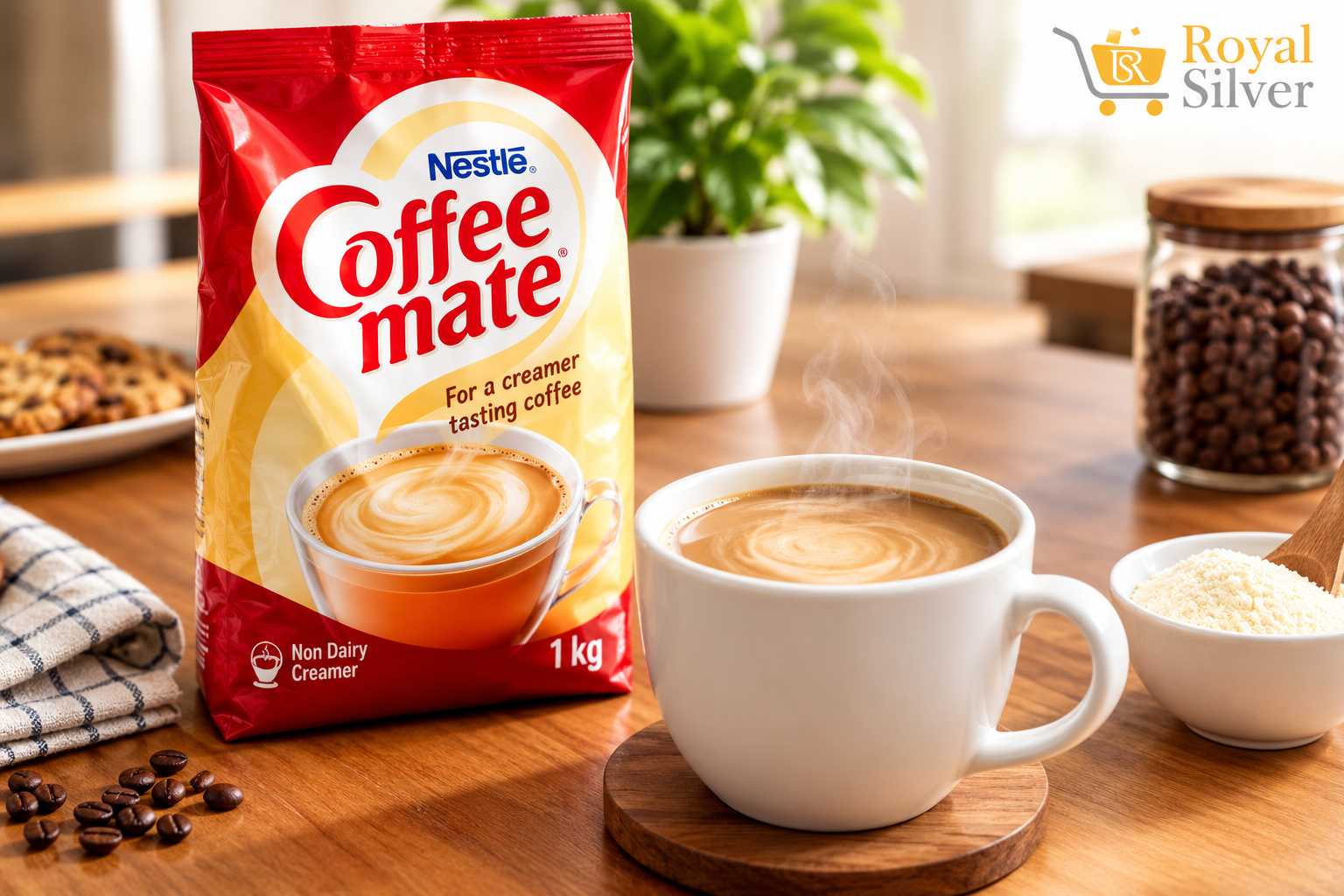 Nestl&eacute; Coffee Mate 1kg non dairy creamer pack beside a steaming cup of creamy coffee on a wooden table, showing a smooth coffee without fresh milk.